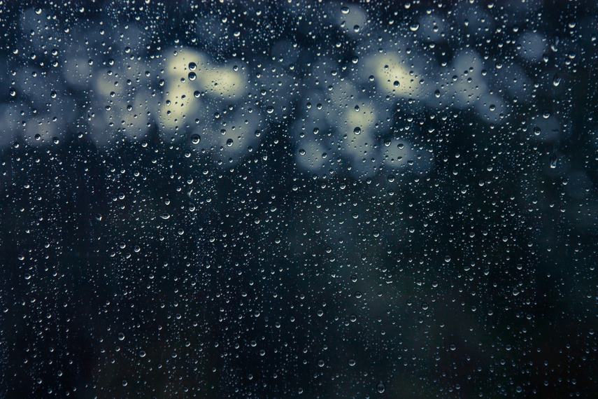 Drops of rain on glass , rain drops on clear window